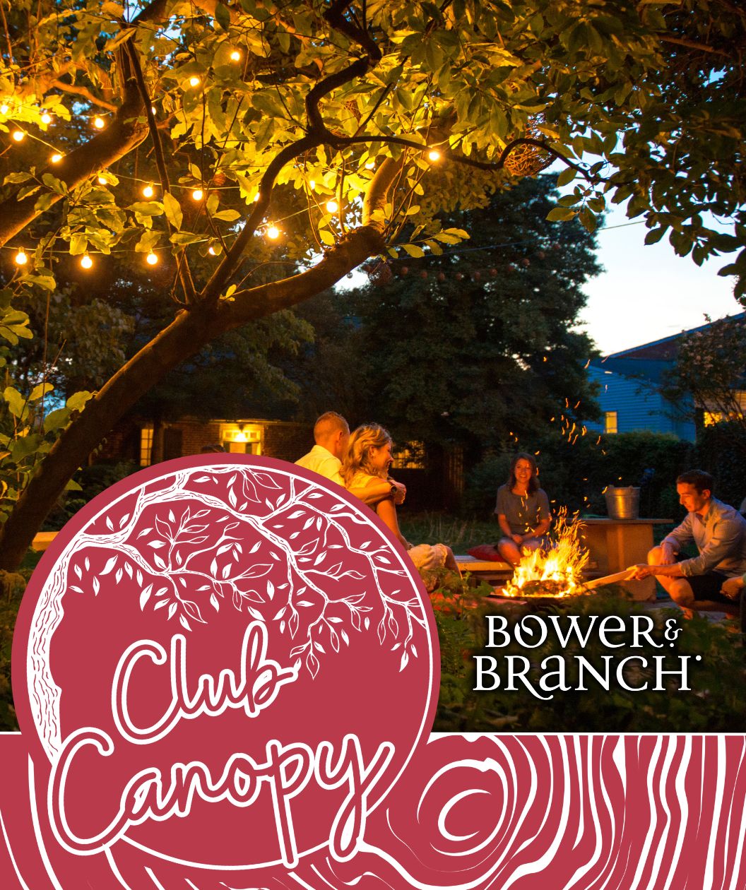 People gathered around a fire pit under a tree with string lights, featuring 'Bower & Branch' and 'Club Canopy' logos.