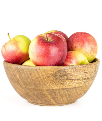 A wooden bowl of State Fair Apple, bright red round apples with yellow-green blush